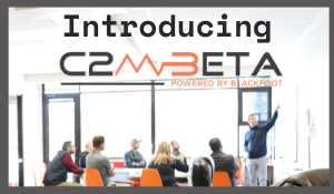 Image of C2M beta office and team working on solutions for the cohort company